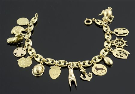 Bracciale "Charms" in oro giallo. gr. 26,6.