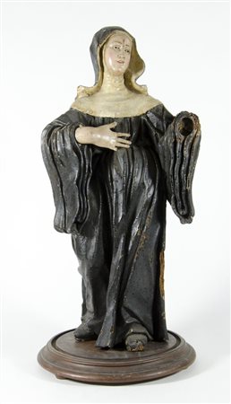 Scultura in legno policromo scolpito raffigurante Santa con occhi in vetro....