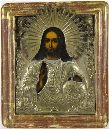 Icona dipinta su tavola raffigurante Cristo pantocratore con riza in metallo....