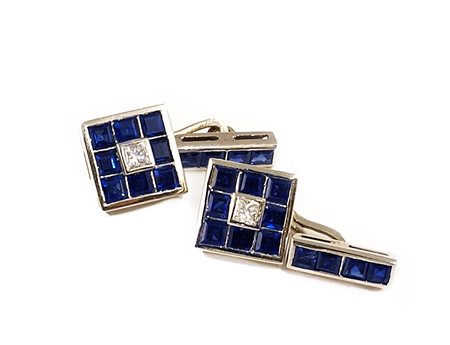 Gemelli in platino con incastonati zaffiri taglio carre per ct. 1,40 circa...