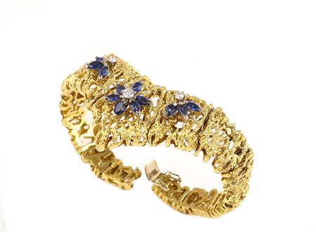 Bracciale in oro giallo 18kt maglia traforata con tre diamanti taglio...