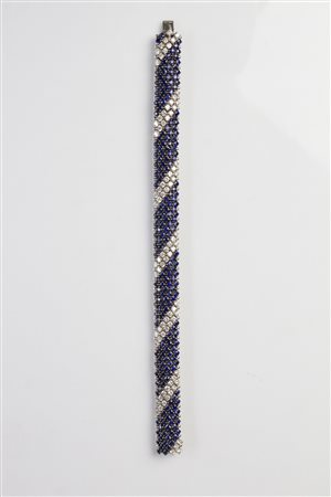 Bracciale con diamanti e zaffiri. . . Bracciale in oro bianco di grammi...