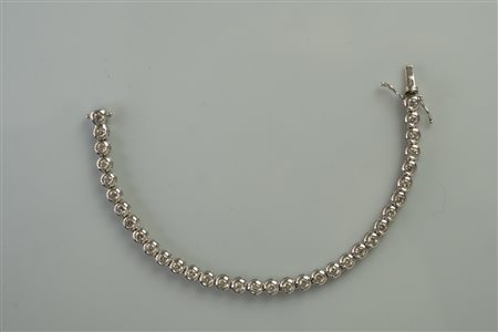 Bracciale tennis in oro bianco con 34 diamanti taglio brillante tondo....