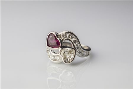 Anello contrarie in oro con diamante e rubino. . . Anello contrarie in oro...
