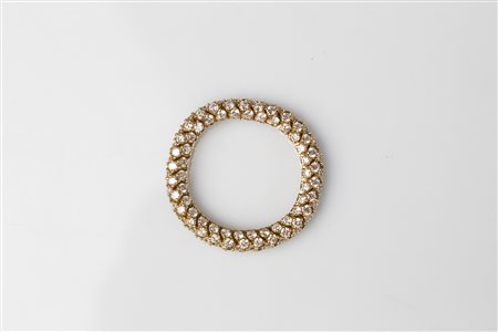 Fede snodata in oro e diamanti. . . Fede snodata in oro rosa di grammi 4,60 e...