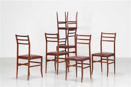 MANIFATTURA ITALIANA Sei sedie in faggio e skai, anni 60. -. Cm 40,00 x 93,00...