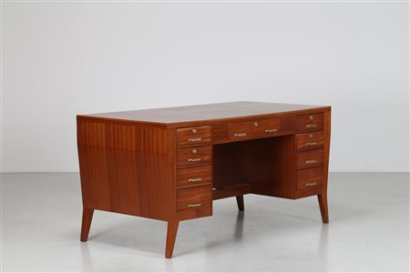 PONTI GIO' (1891 - 1979) Scrivania in mogano e maniglie in ottone laccato,...