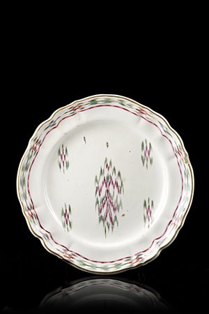 Manifattura di Pasquale Rubati, Milano 1770/90. Piatto polilobato in maiolica...