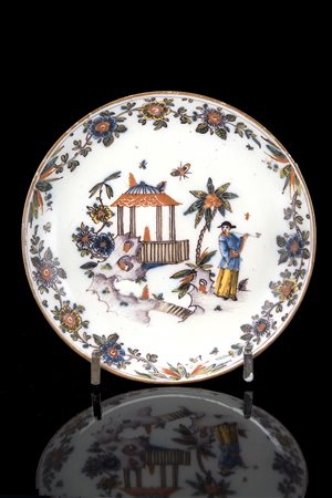 Manifattura di Felice Clerici, Milano, 1745/80. Piatto tondo in maiolica con...