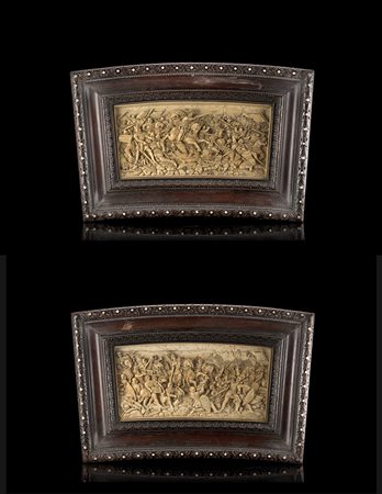 Scultore del secolo XVIII. Coppia di altorilievi in avorio scolpiti a scene...