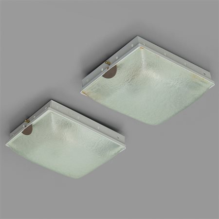 FONTANA ARTE Due plafoniere '1938', circa 1960. Lamierino verniciato, ottone...