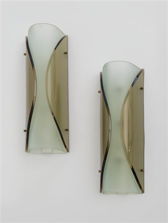 FONTANA ARTE Due lampade a parete "2188", circa 1962. Lamierino di ferro...