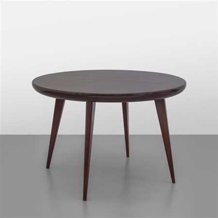 GIO PONTI Un tavolo per CASA E GIARDINO, anni '40. Legno di palissandro,...