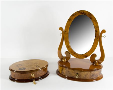 Lotto composto da scatoletta ovale portagioie e toilette da tavolo con specchio.