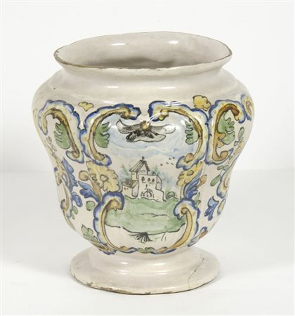 Vaso in maiolica decorato a policromia con motivi rocaille e paesaggio. XVIII...