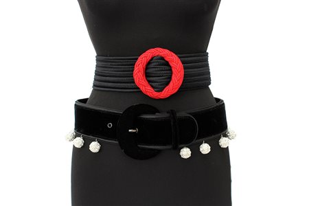 YVES SAINT LAURENT Lotto di due cinture alte di materiali, forme, dimensioni...