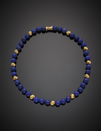 Collana in boules di lapislazzuli di mm 11 circa, alternate a boules rigate...