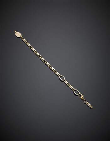 BARAKA'Bracciale a catena in oro giallo e bianco, g 21,53, lungh. cm 21,70...