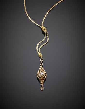 Saliscendi in oro giallo, la spilla non di competenza in oro rosso 333/1000 e...