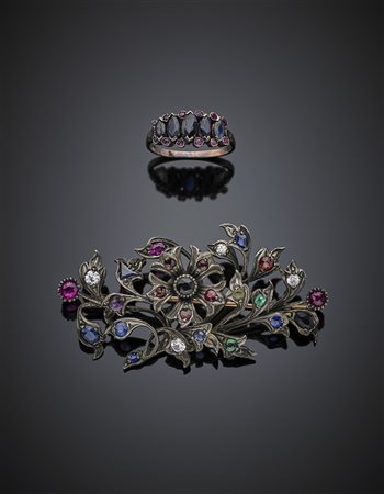 Lotto composto da una spilla e un anello in argento e oro 333/1000 con gemme...