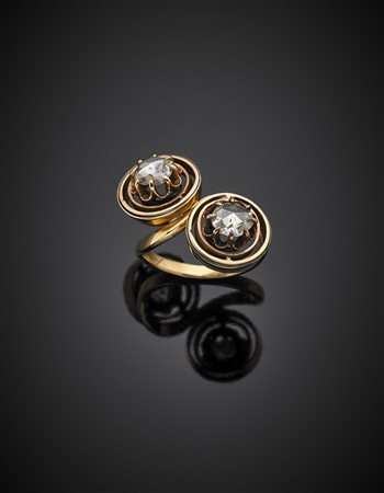 Anello in oro giallo a contrarié con due diamanti a mezza rosetta g 8,18...