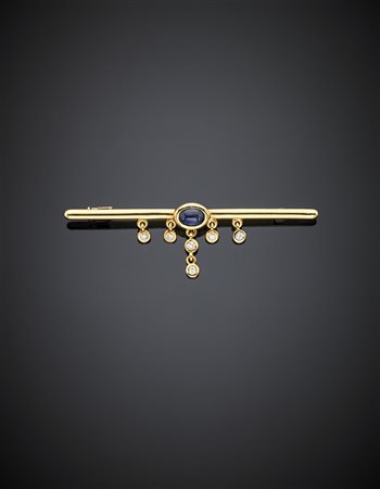 FARAONESpilla a barretta in oro giallo con zaffiro cabochon di ct. 0,80 circa...