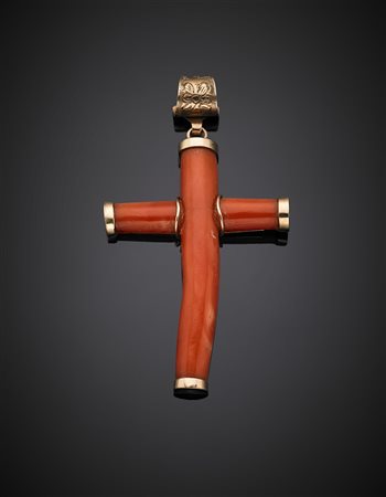 Croce in corallo rosso arancione rifinita in oro rosso 333/1000 in parte...