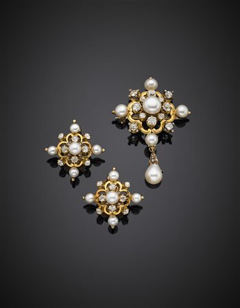 Demi-parure composta da orecchini a lobo con clip e spilla in oro giallo...