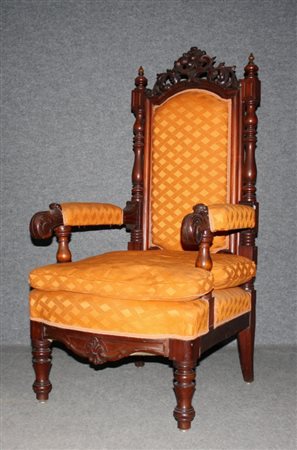 Firmato, datato. Poltrona in legno di mogano intagliato. XIX secolo. Mis....