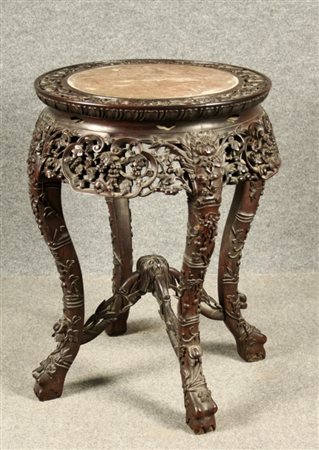 Firmato, datato. Trespolo portavaso in legno intagliato con piano in marmo....