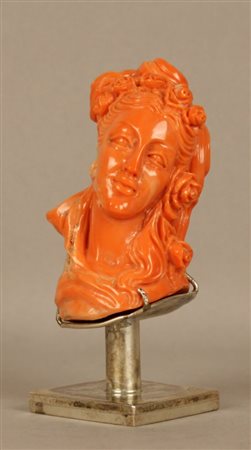 Datato. Scultura in corallo rosa raff. ''BUSTO DI DONNA'', gr. 155, montata...