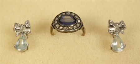 Firmato, datato. Lotto composto da un anello in oro bicolore con zaffiro e...