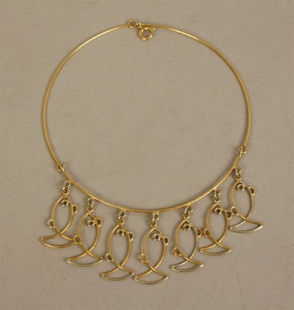 Firmato. Girocollo in oro giallo con pendenti a forma di pesci, gr. 22. XX...
