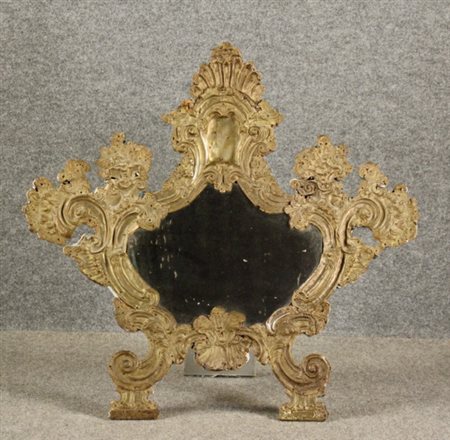 Cantagloria a specchiera in metallo. XVIII secolo. Difetti. Mis. Lung. cm. 67...