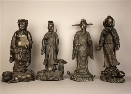 Quattro sculture in bronzo raff. ''SANTONI''. Cina. XX secolo. Mis. Alt. cm....