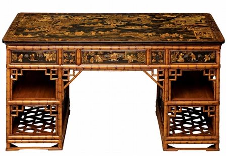 Firmato, datato. Scrivania in bambù laccato e dorato con decorazioni raff....