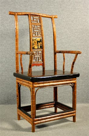 Firmato, datato. Poltrona in bambù e lacca. Cina. Inizi XX secolo.