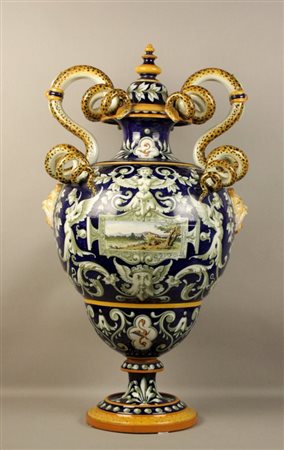 Firmato, datato. Vaso in ceramica istoriato con manici a forma di serpente,...