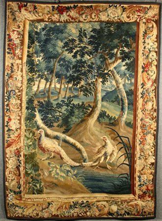 Firmato. Arazzo raff. ''PAESAGGIO CON ANIMALI''. Inizi XVIII secolo....