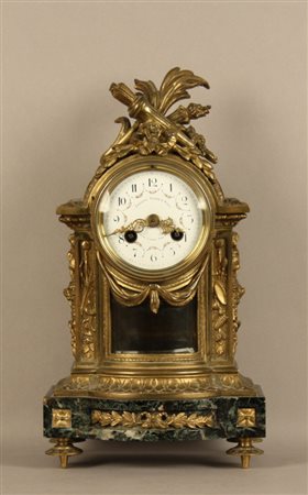 Firmato, datato. JANETTI PADRE E FIGLI. Orologio in bronzo cesellato. Firmato...