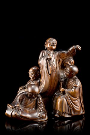 Scultura in legno di bosso raffigurante gruppo di saggiCina, secolo XIX(h. 12...