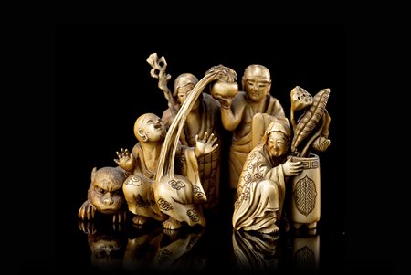 Okimono in avorio raffigurante un gruppo di personaggi leggendariGiappone,...