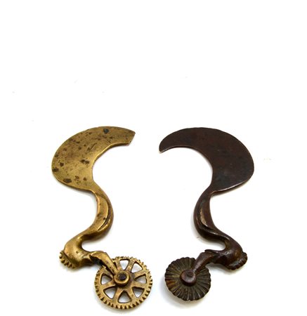 Due speroni da pasta in ottone sagomato (Finlay p 9; Landini p...