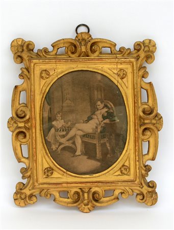 Cornice in legno intagliato e dorato a luce ovale (cm totali 24x28) (difetti)