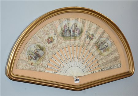 Ventaglio con stecche in avorio inciso e traforato e pagina in carta decorata...