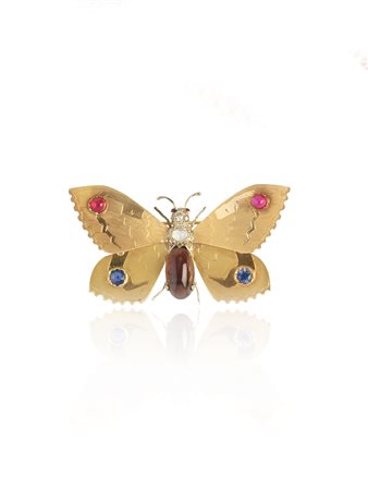 SPILLA IN ORO DEI TRE COLORI, GRANATO, DIAMANTI, RUBINI SINTETICI E ZAFFIRI...