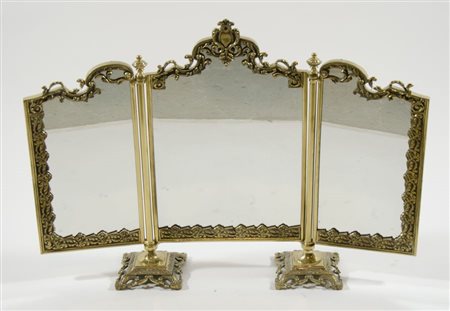 Parafiamme in bronzo dorato a 3 ante specchiate.