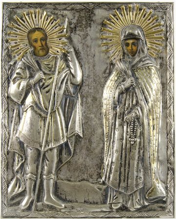 Icona dipinta su tavola due figure con riza 9n argento sbalzato. cm. 24x19.