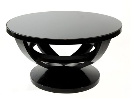 Grande tavolo basso in legno nero con piano in vetro fumè. H. cm. 57, diam....