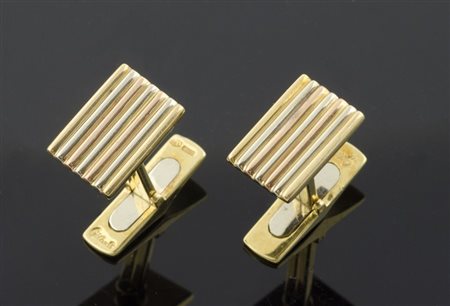 Paio di gemelli in oro giallo a scanalature. Gr. 14,4